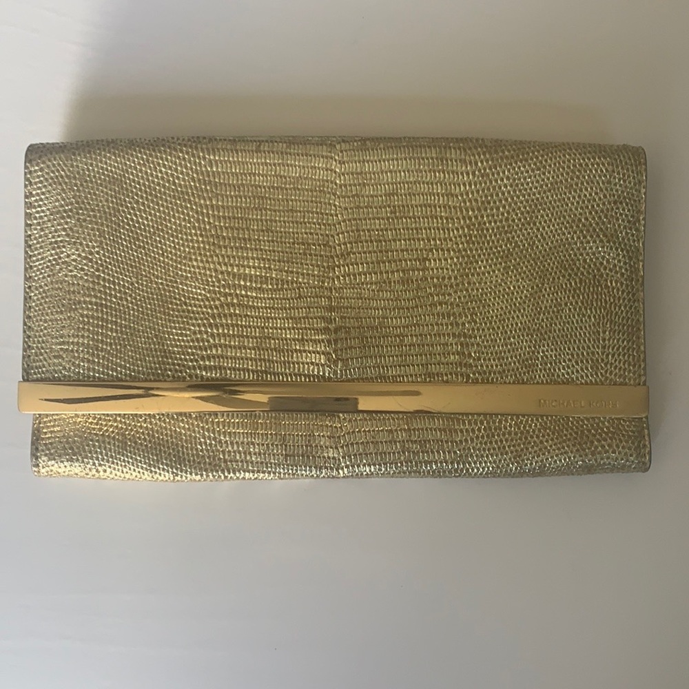Authentic Michael Kors gold clutch